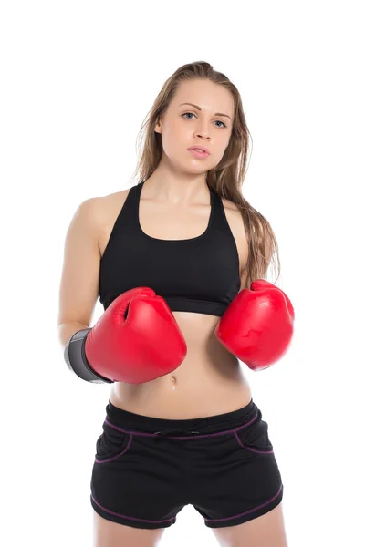 Vrouw poseren in grote bokshandschoenen — Stockfoto