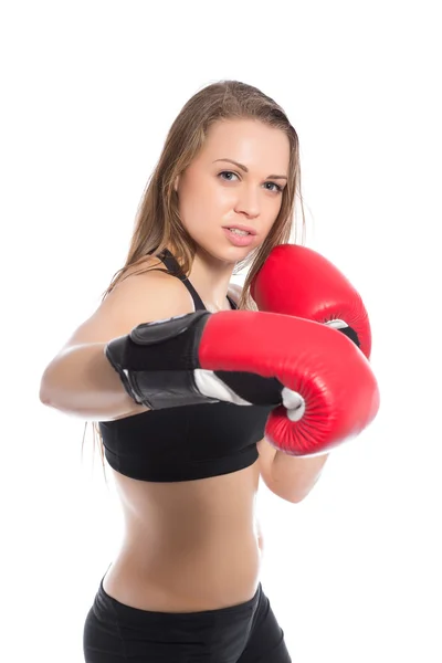 Woman demonstrating red boxing gloves — Stock Photo, Image