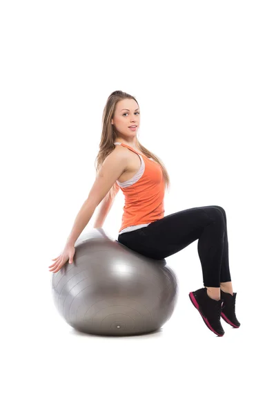 Kadının fit Ball egzersizler yapması Stok Resim