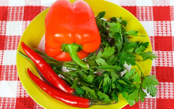 Parsley, sweet and hot peppers in a bowl — Stock Photo, Image