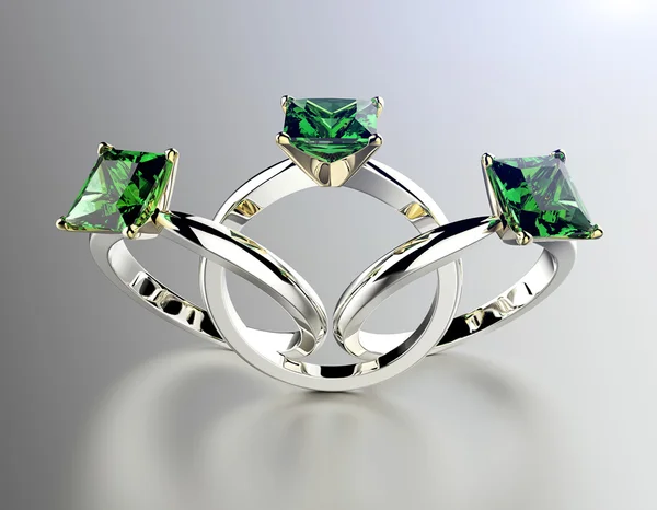 Nişan yüzüğü ile emerald. — Stok fotoğraf