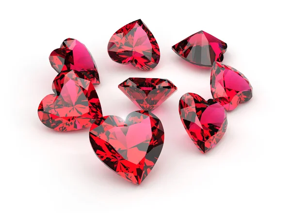 Forma do coração pedras preciosas vermelhas — Fotografia de Stock
