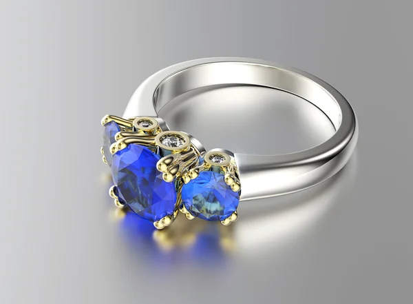 Золотое обручальное кольцо с сапфиром — стоковое фото
