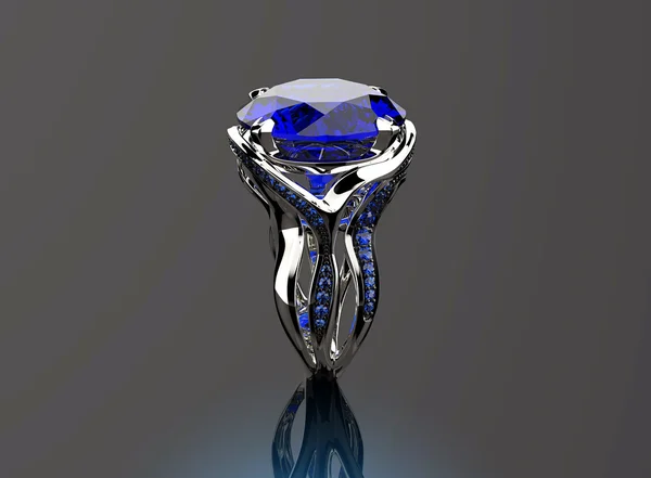 与蓝宝石的金戒指. — 图库照片