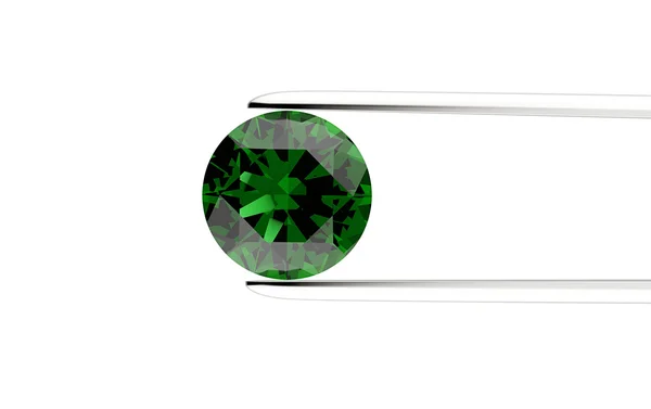Green gemstone in the tweezers — Stock Photo, Image