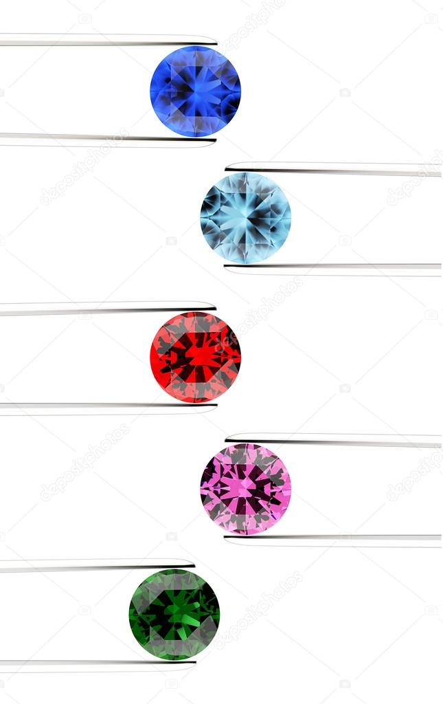 Close-up of gemstones in the tweezers