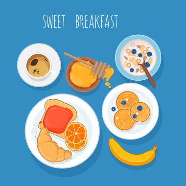 Mavi zemin üzerine tatlı kahvaltı. Üstten Görünüm.