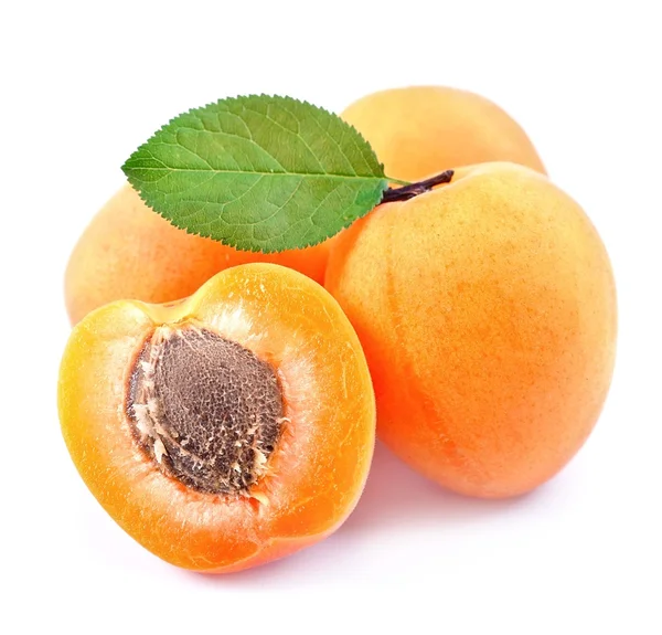 Sweet apricots with leafs isolated — Stock Photo, Image