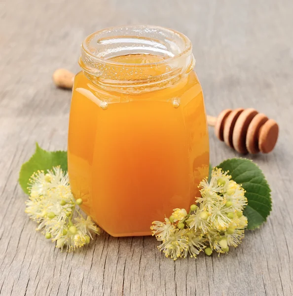 Honey with linden flowers. — Stock Photo, Image