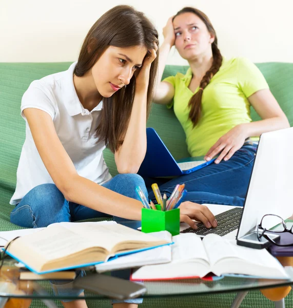 Two melancholy female students — Stock Photo, Image