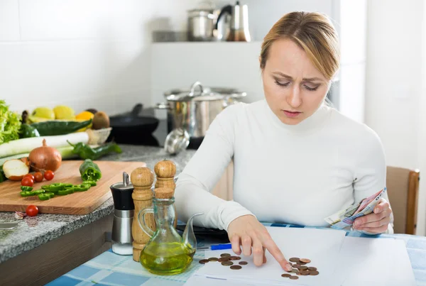 Broke woman with money and bills — Stock Photo, Image