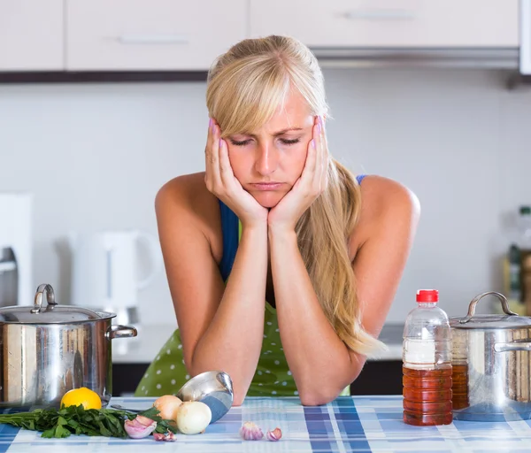 Nervous woman at home kitchen — Stock Photo, Image