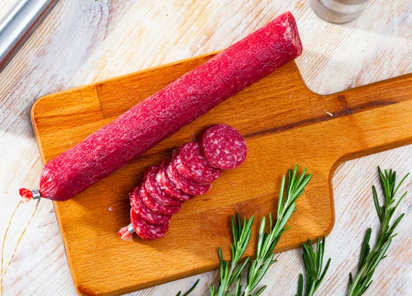 Sliced dry cured pork sausage Fuet Nobleza — Stock Photo, Image