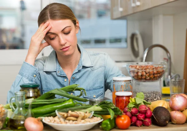 Tired woman sitting at home kitchen — Stock Photo, Image