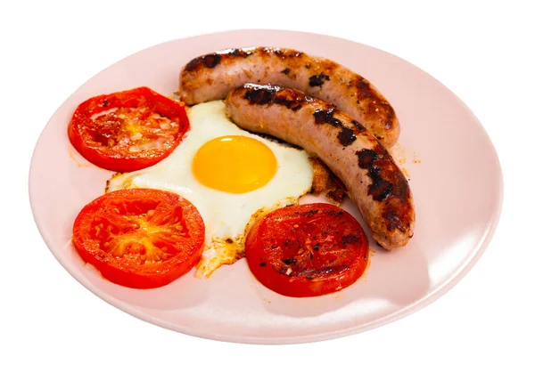 Desayuno con huevos soleados con salchichas y tomates —  Fotos de Stock