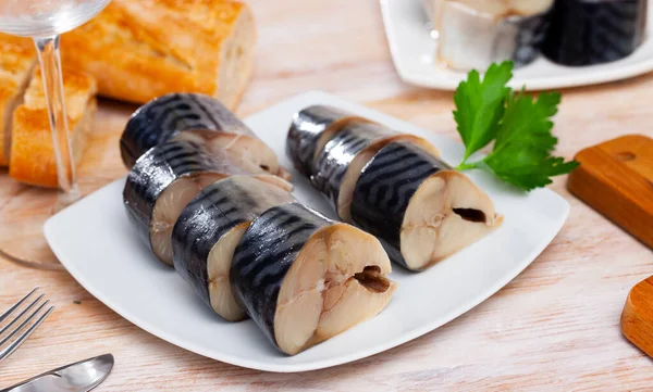 Salted scomber with baguette on plate — Stock Photo, Image