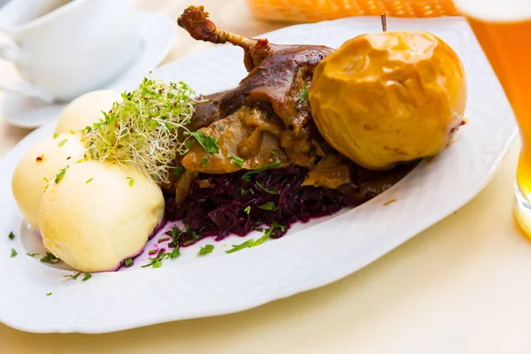 Baked duck with blue cabbage and yeast dumplings — Stock Image Baked duck with blue cabbage and yeast dumplings Royalty Free Stock Photos