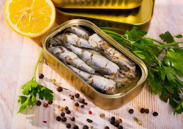Open can of sardines in oil — Stock Image Open can of sardines in oil Stock Picture