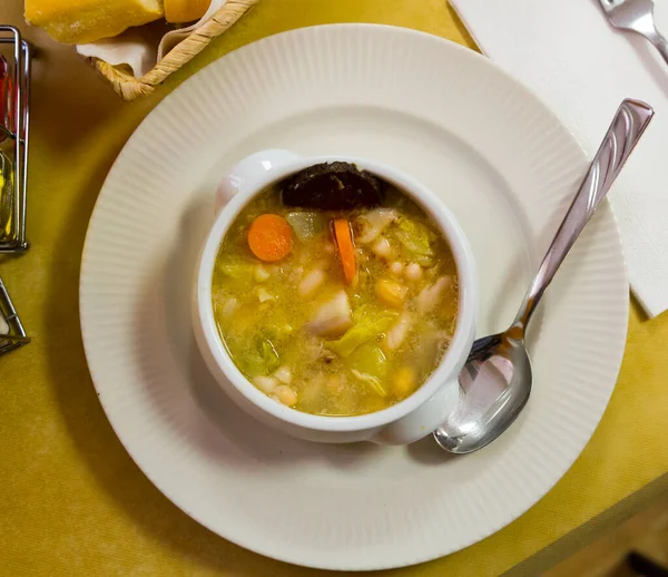 Catalan soup of bean with boiled carrots, potatoes and blood sausage — Stock Photo, Image