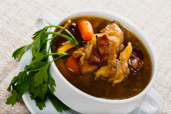 Tasty scottish traditional soup cock-a-leekie with chicken, bacon and leek — Stock Image Tasty scottish traditional soup cock-a-leekie with chicken, bacon and leek Royalty Free Stock Photos