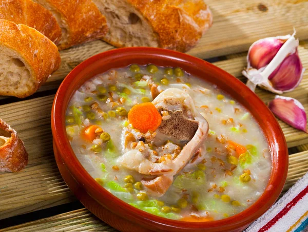 Soup of lamb with pearl barley, green peas and cabbage in bowl — Stock Image Soup of lamb with pearl barley, green peas and cabbage in bowl Royalty Free Stock Photos
