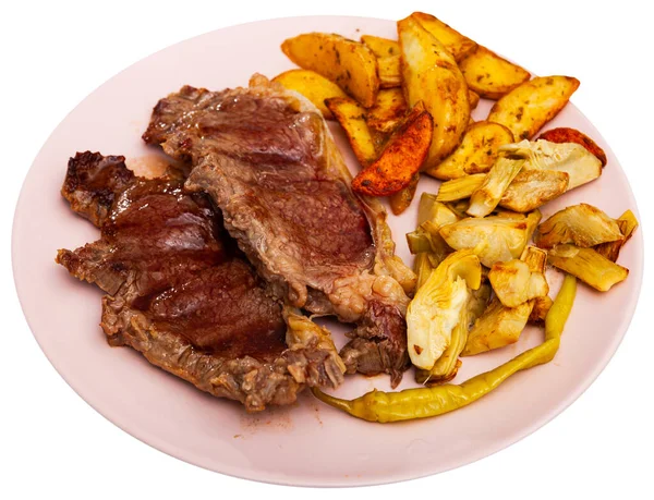 Tasty baked beef steak with potatoes and artichokes — Stock Photo, Image