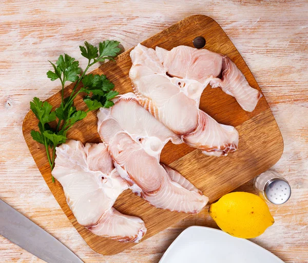 Raw seafood, fresh tiger shark fillet on board — Stock Photo, Image