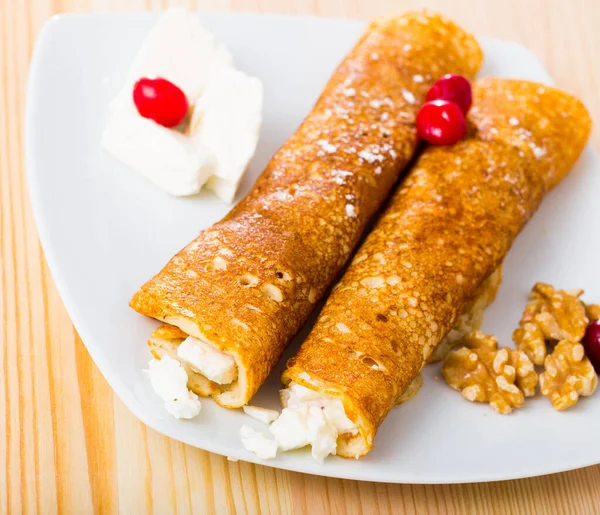 Bulgarian dish of pancakes with filling from brynza and walnuts — Stock Photo, Image