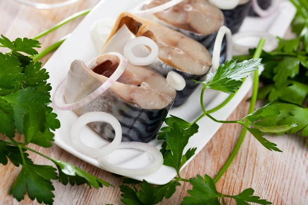 Marinated mackerel with sliced onion and parsley — Stock Photo, Image