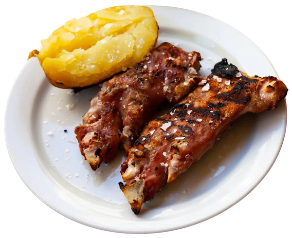 Cocina americana de cerdo asado trotter con espárragos servidos con perejil en plato sobre mesa — Foto de Stock