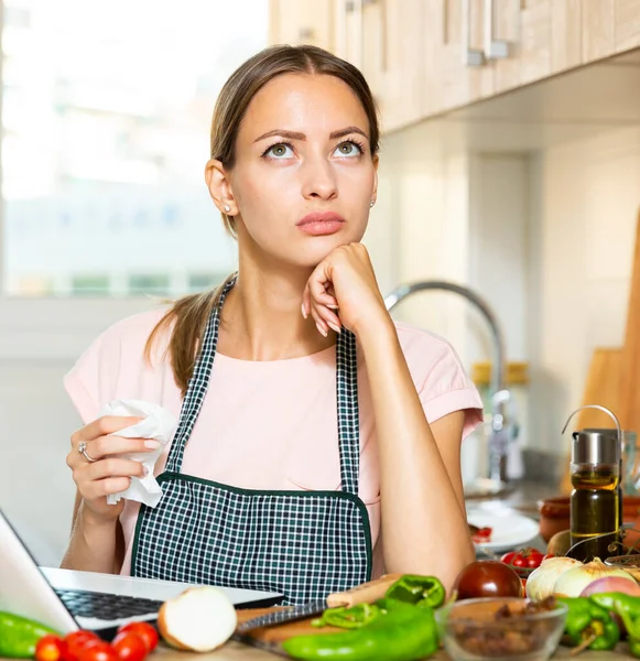 Sad and tired housewife sitting at kitchen — Stock Photo, Image