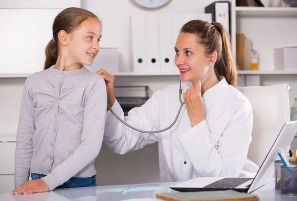 Doctor leading medical appointment with stethoscope — Stock Photo, Image