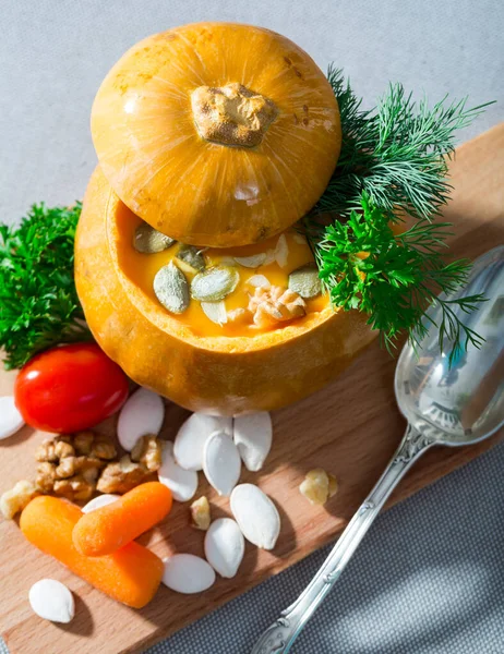 Recipe of squash soup in baked pumpkin — Stock Photo, Image