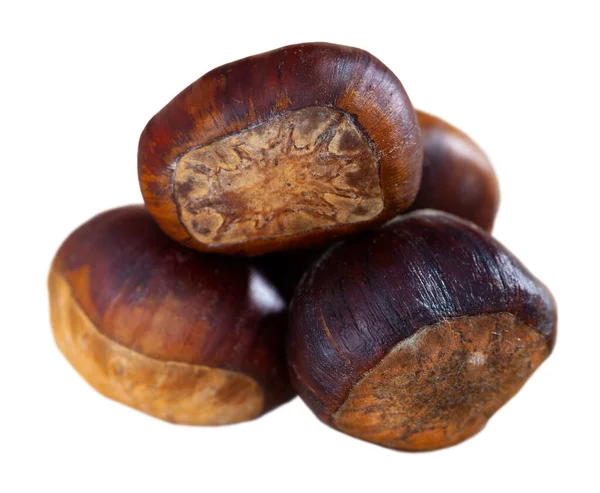 Heap of dark brown edible chestnuts — Stock Photo, Image