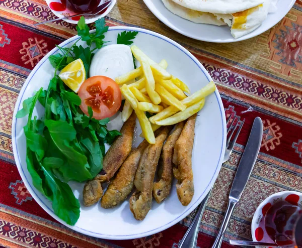 Roasted red mullet with potatoes and vegetables — Stock Photo, Image