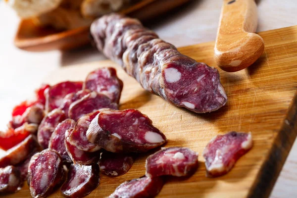 Sliced french dry sausage — Stock Photo, Image