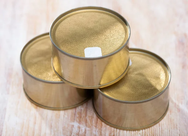 Metal cans with foil lids — Stock Photo, Image