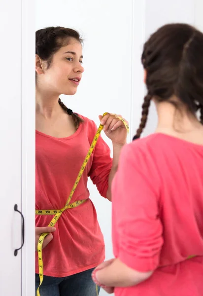 Girl happy to lose weight — Stock Photo, Image