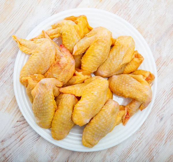 Farmer chicken wings on white plate — Stock Photo, Image