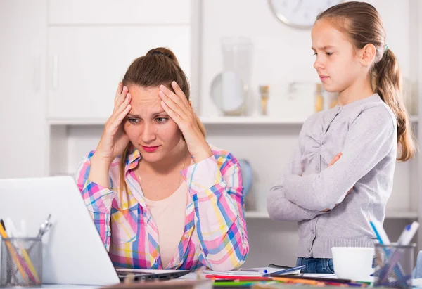 Irritated mother watching at the mistakes — Stock Photo, Image