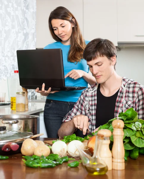 Nice girl shows the new recipe — Stock Photo, Image