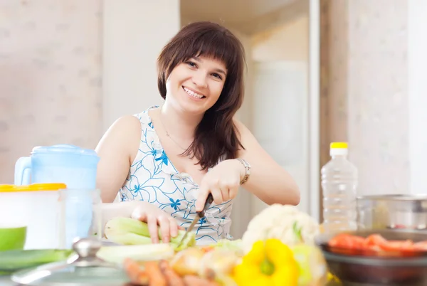 Housewife cooking with celery — Stock Photo, Image