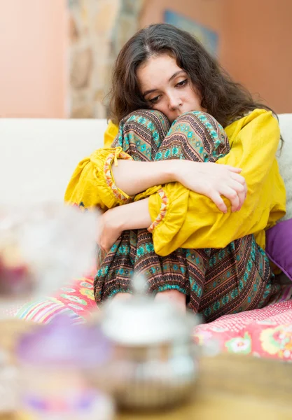 Upset girl couch portrait — Stock Photo, Image