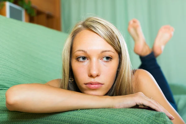 Blonde unhappy woman at home — Stock Photo, Image