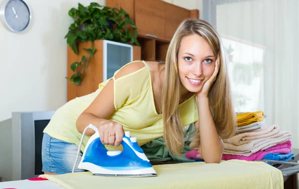 Girl ironing at home — Stock Photo, Image