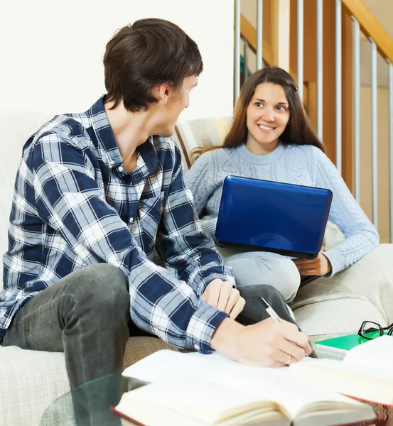 Young couple preparing for exam — Stock Photo, Image