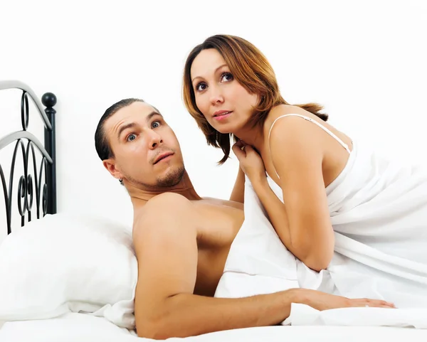 Frightened man and woman caught during adultery — Stock Photo, Image