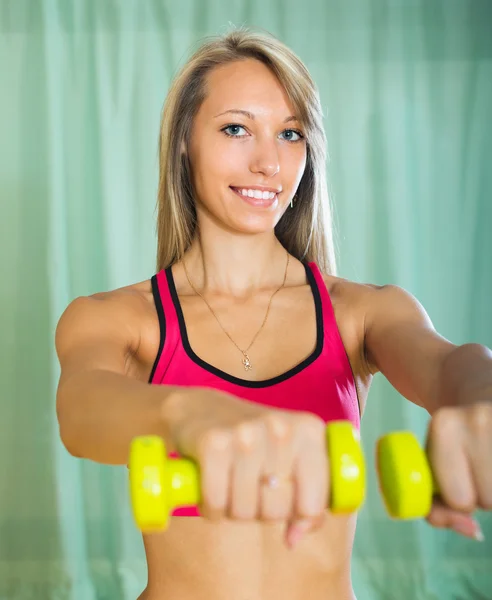 Girl working out indoor — Stock Photo, Image