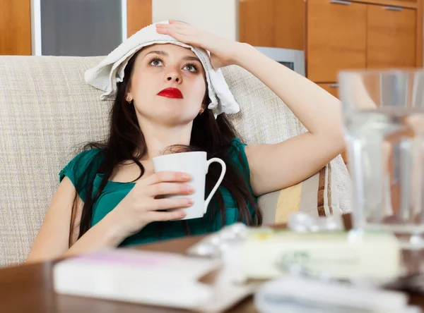 Woman  stuping  towel — Stock Photo, Image