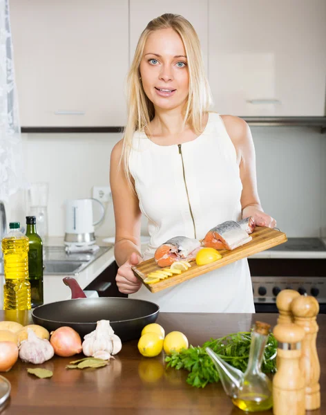 Happy housewife cooking — Stock Photo, Image
